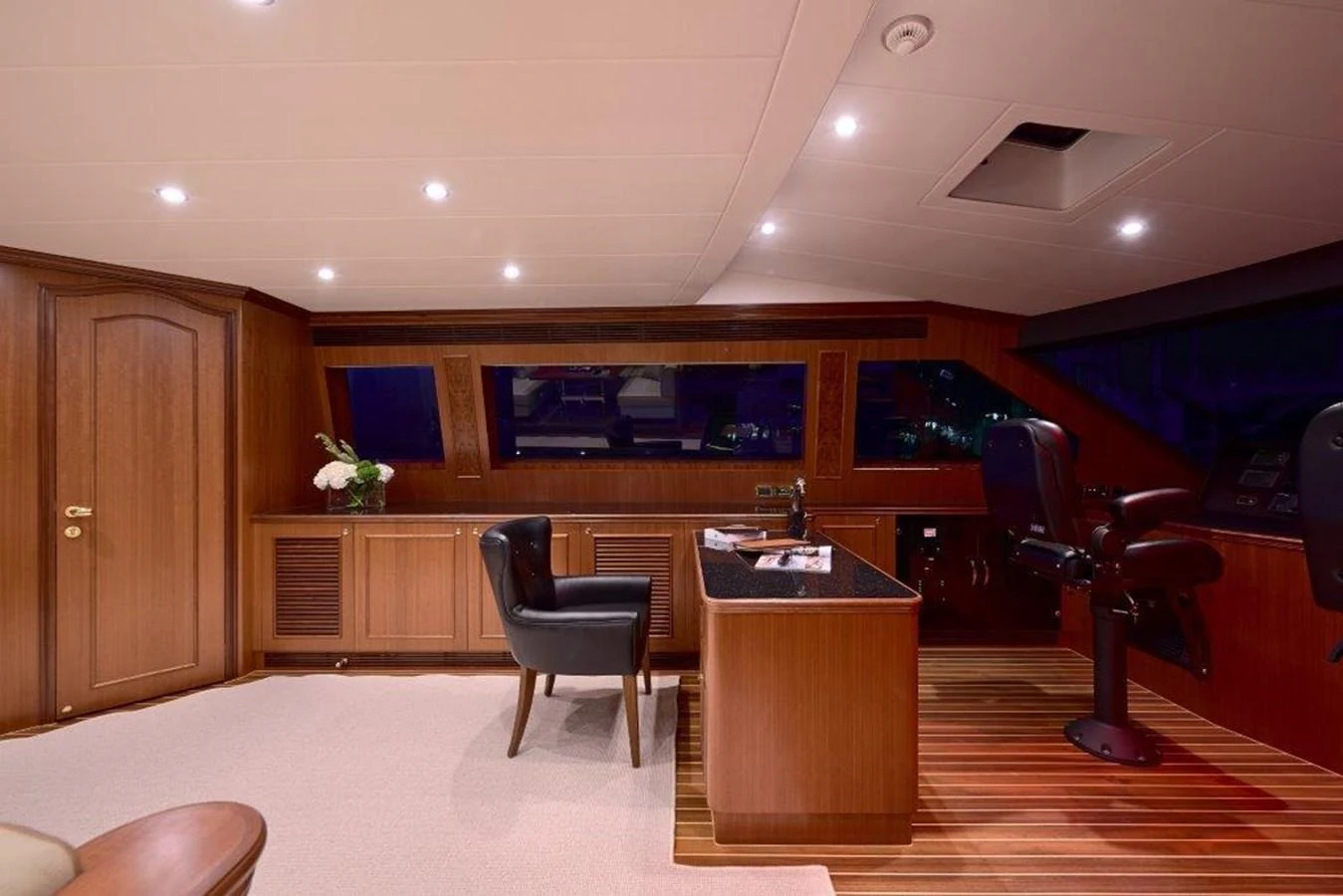 a room with a desk and chairs aboard P110 (NEW BOAT SPEC) Yacht for Sale