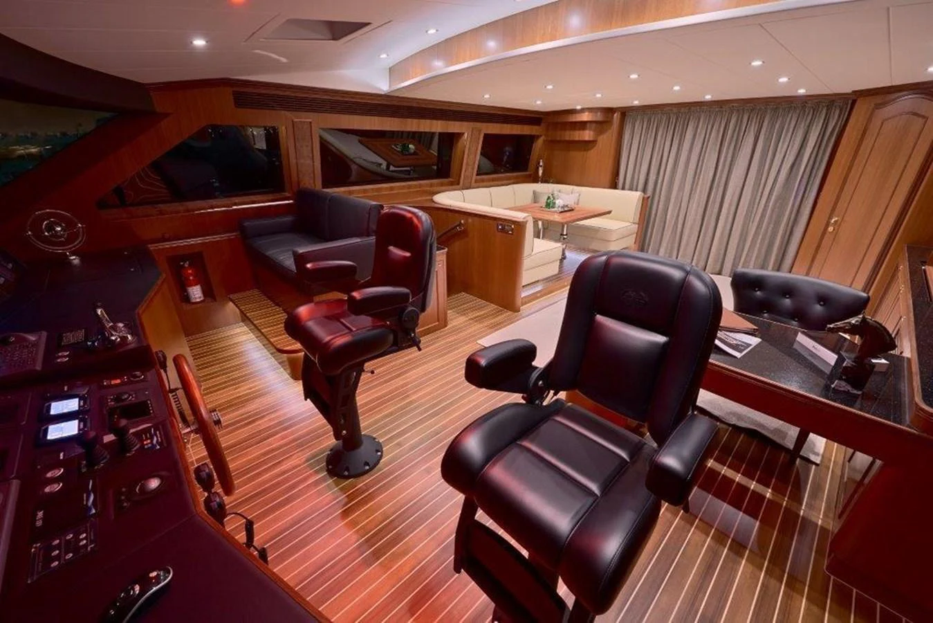 a room with a desk and chairs aboard P110 (NEW BOAT SPEC) Yacht for Sale