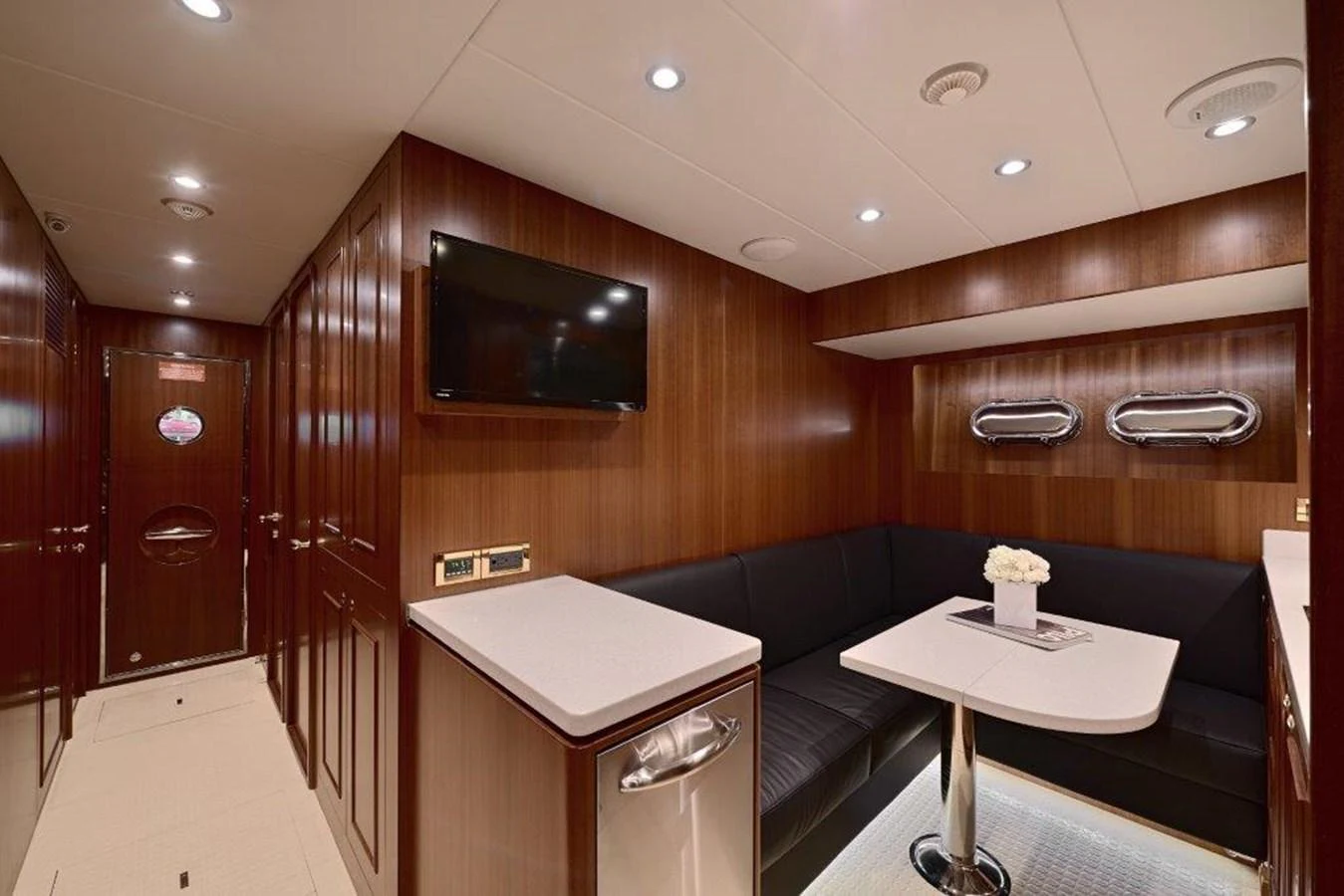 a room with a couch and a tv aboard P110 (NEW BOAT SPEC) Yacht for Sale