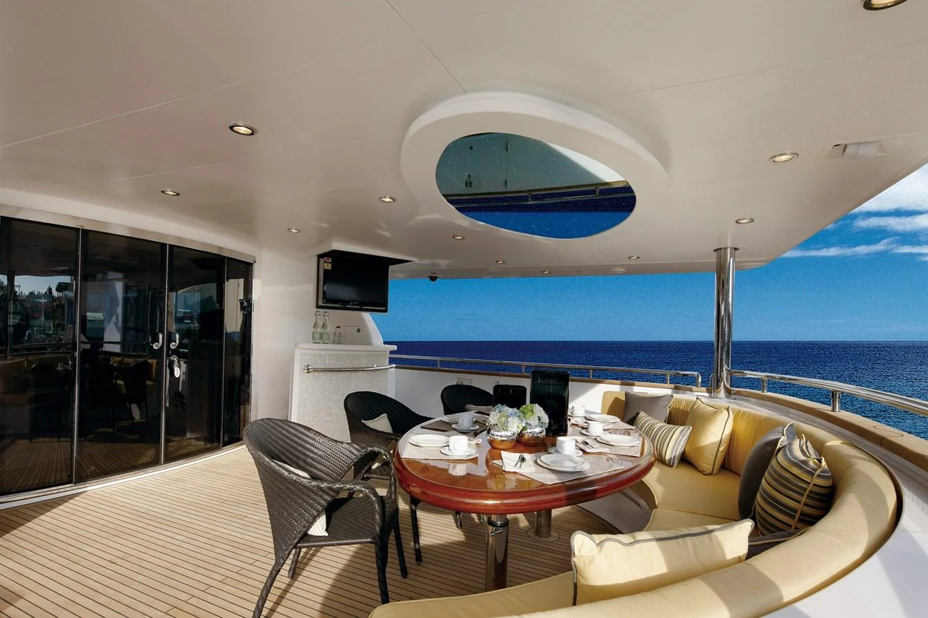 a room with a table and chairs aboard P110 (NEW BOAT SPEC) Yacht for Sale