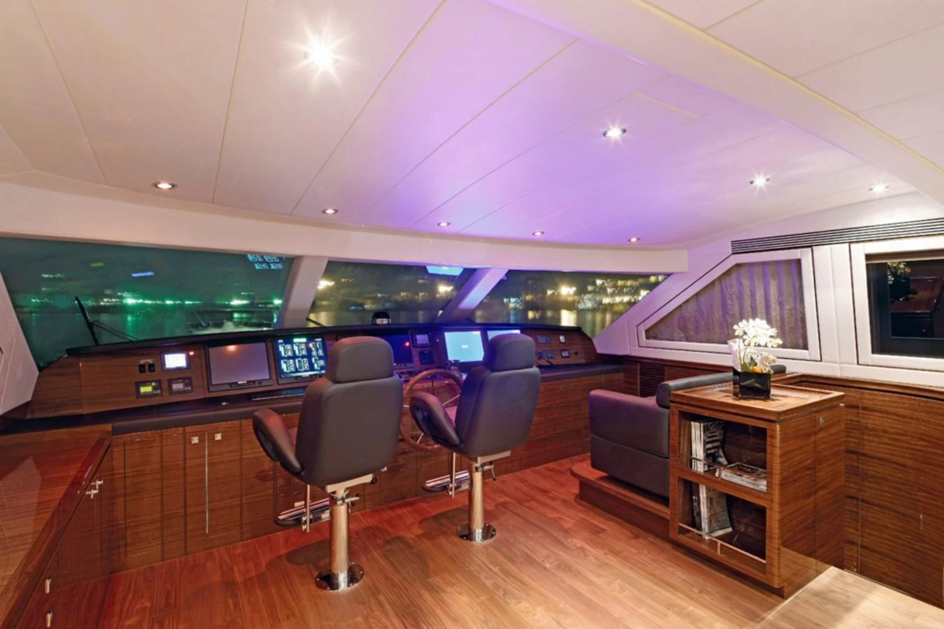 a room with a table chairs and a tv aboard P110 (NEW BOAT SPEC) Yacht for Sale