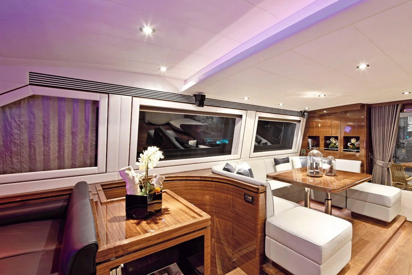 a living room with a tv and furniture aboard P110 (NEW BOAT SPEC) Yacht for Sale