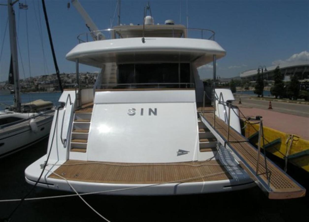 a white boat docked aboard TECNOMAR 34 NADARA Yacht for Sale