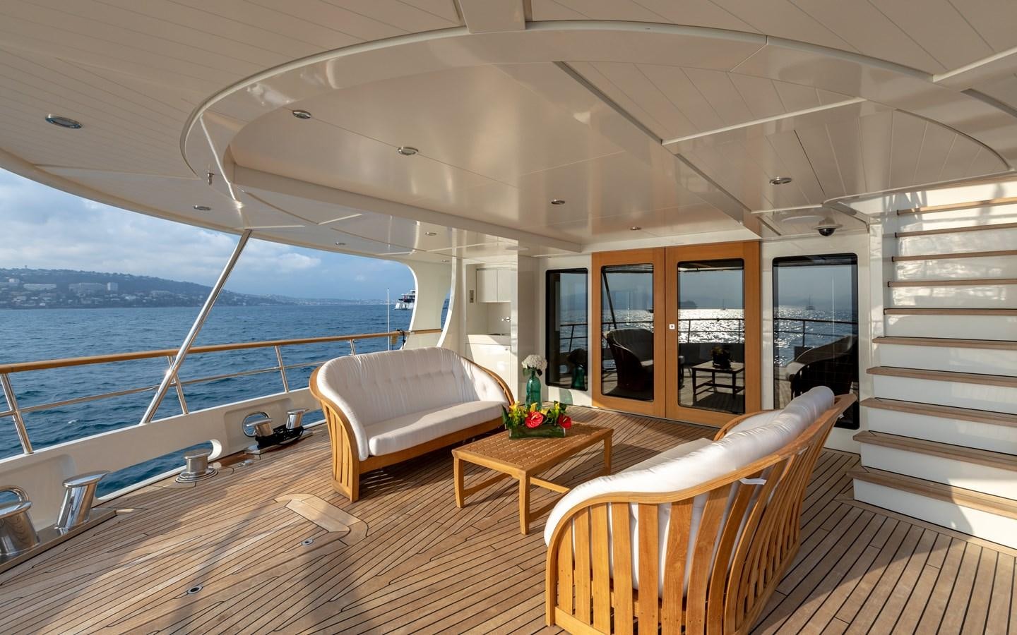 a living room with a large body of water aboard ROBBIE BOBBY Yacht for Charter