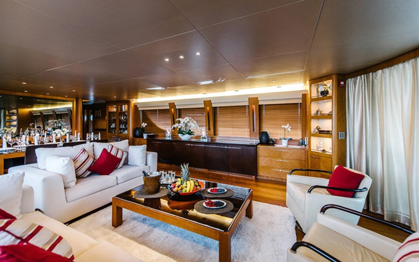 a living room with a piano aboard DREAM Yacht for Sale