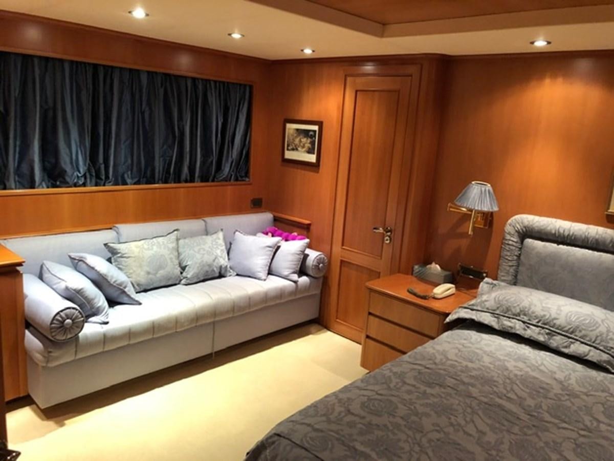 a hotel room with two beds aboard ENERGY Yacht for Sale