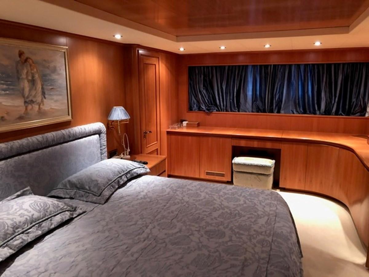 a hotel room with a bed aboard ENERGY Yacht for Sale