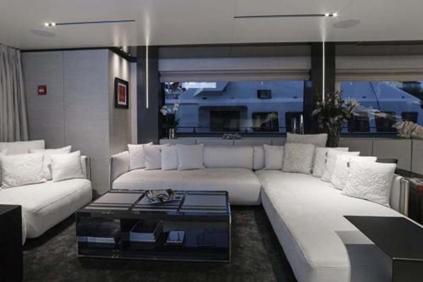 a living room with a large window aboard DECEMBER SIX Yacht for Sale