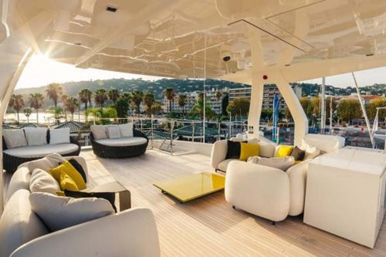 a large living room with a large glass window aboard DECEMBER SIX Yacht for Sale