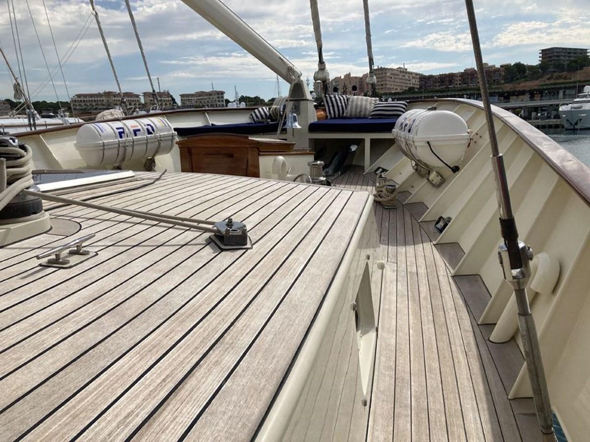 a deck with a deck and a view of a city aboard TIGERLILY OF CORNWALL Yacht for Sale