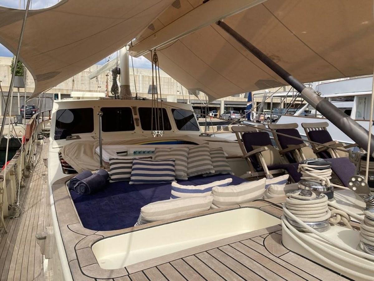a boat with many chairs around it aboard TIGERLILY OF CORNWALL Yacht for Sale