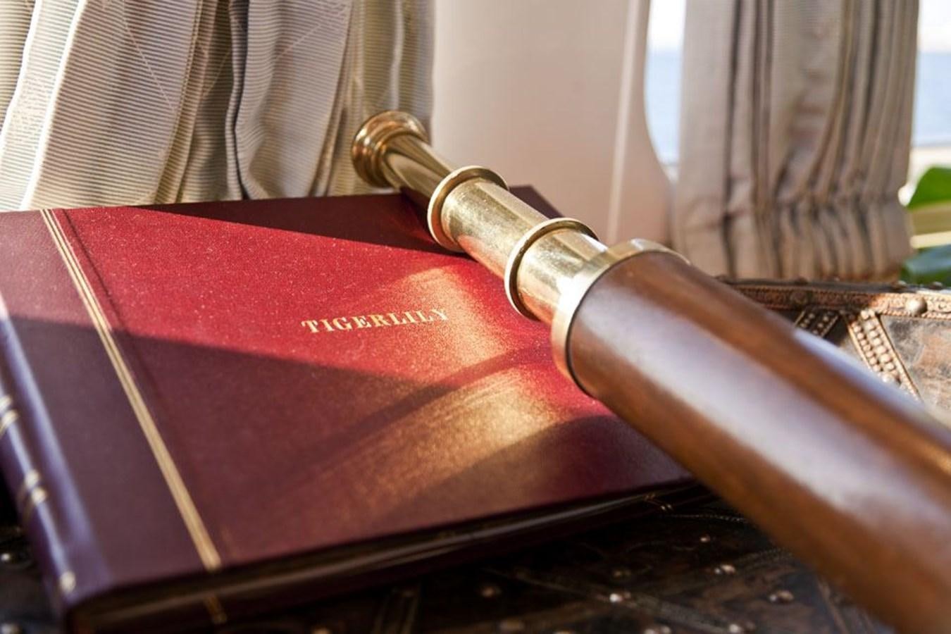a red book with a handle aboard TIGERLILY OF CORNWALL Yacht for Sale