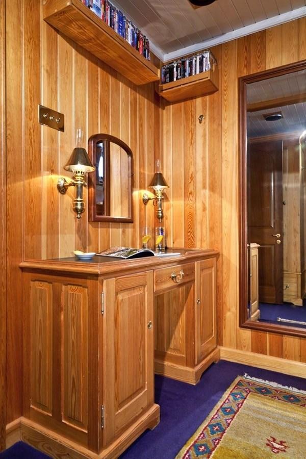 a wooden cabinet in a room aboard TIGERLILY OF CORNWALL Yacht for Sale
