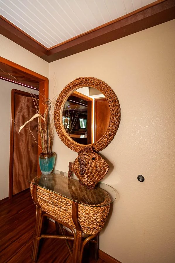 a basket on a chair aboard LE COLBY JEAN Yacht for Sale