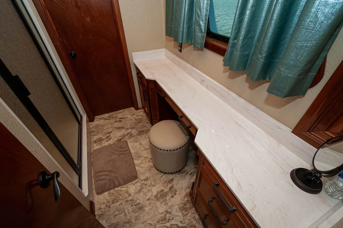 a bathroom with a rug and a rug aboard LE COLBY JEAN Yacht for Sale