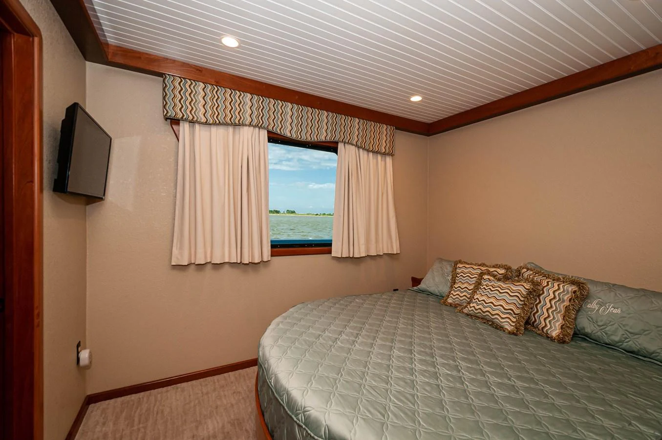 a bed in a room aboard LE COLBY JEAN Yacht for Sale