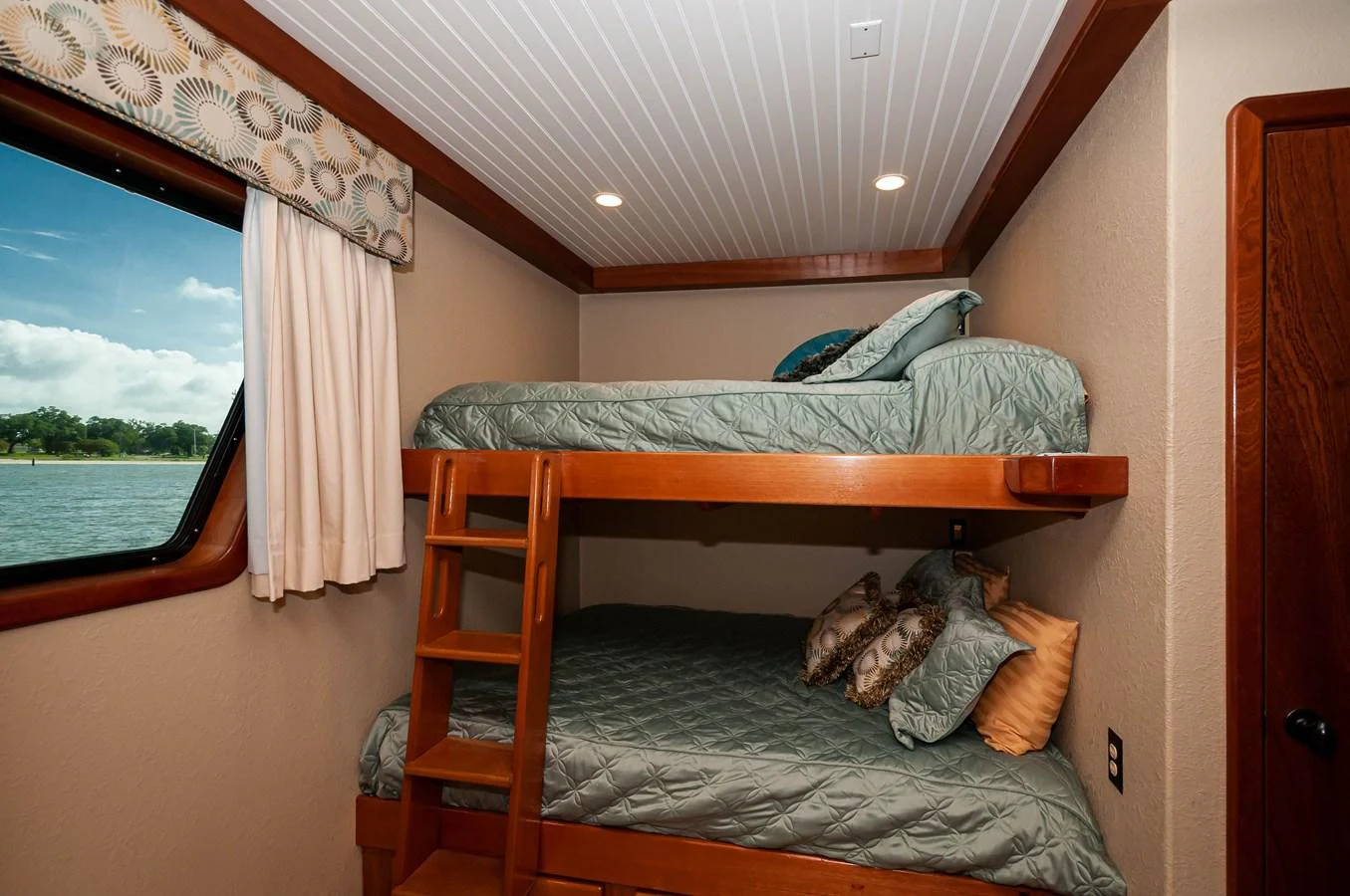 a bed in a room aboard LE COLBY JEAN Yacht for Sale