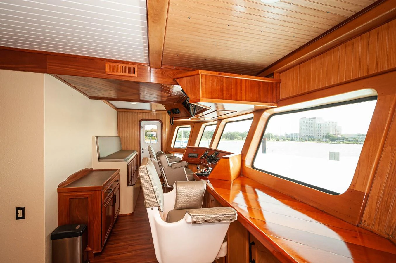 a room with a bed and a desk aboard LE COLBY JEAN Yacht for Sale