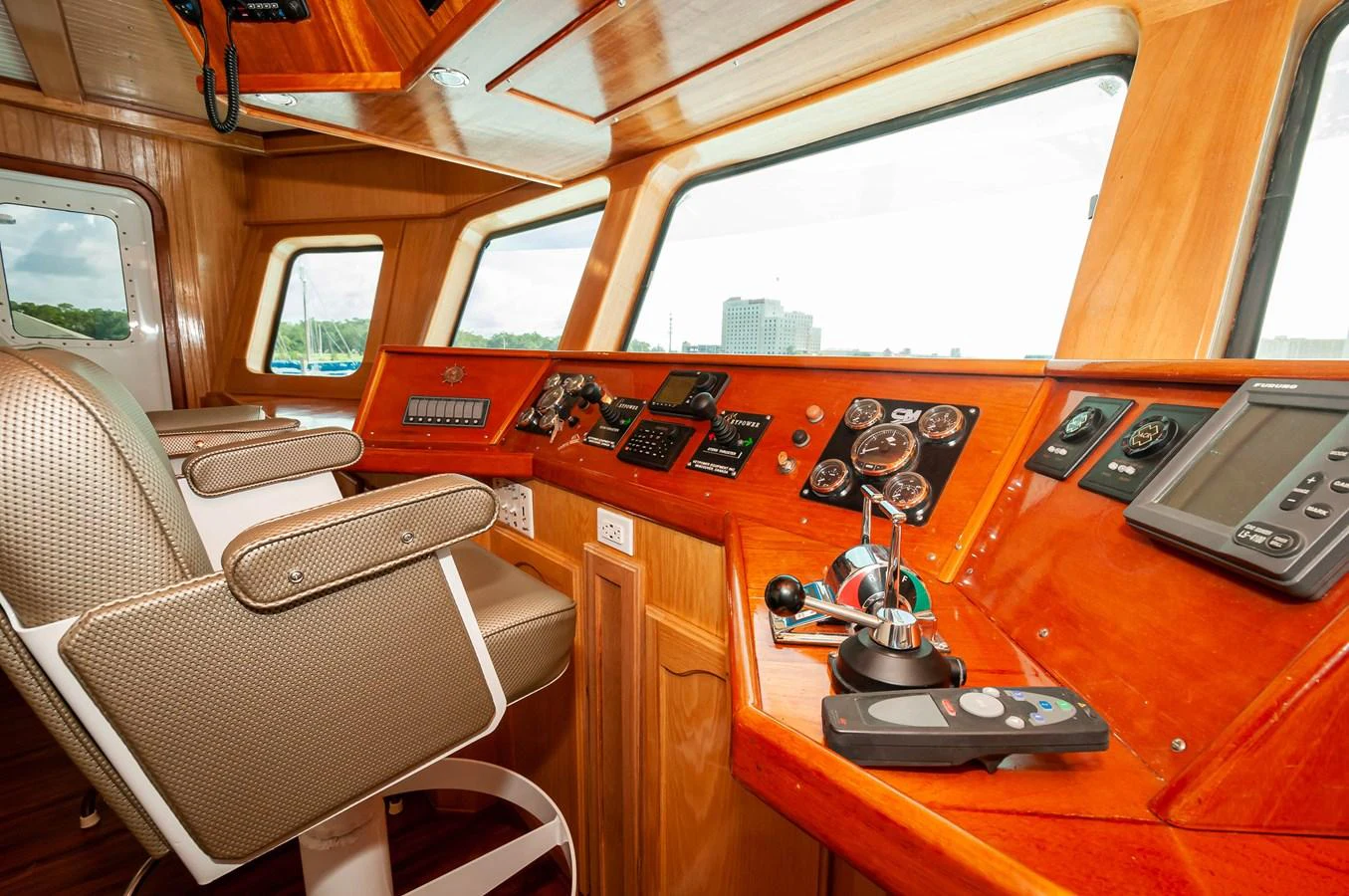 inside of a vehicle with a table and chairs and a window aboard LE COLBY JEAN Yacht for Sale