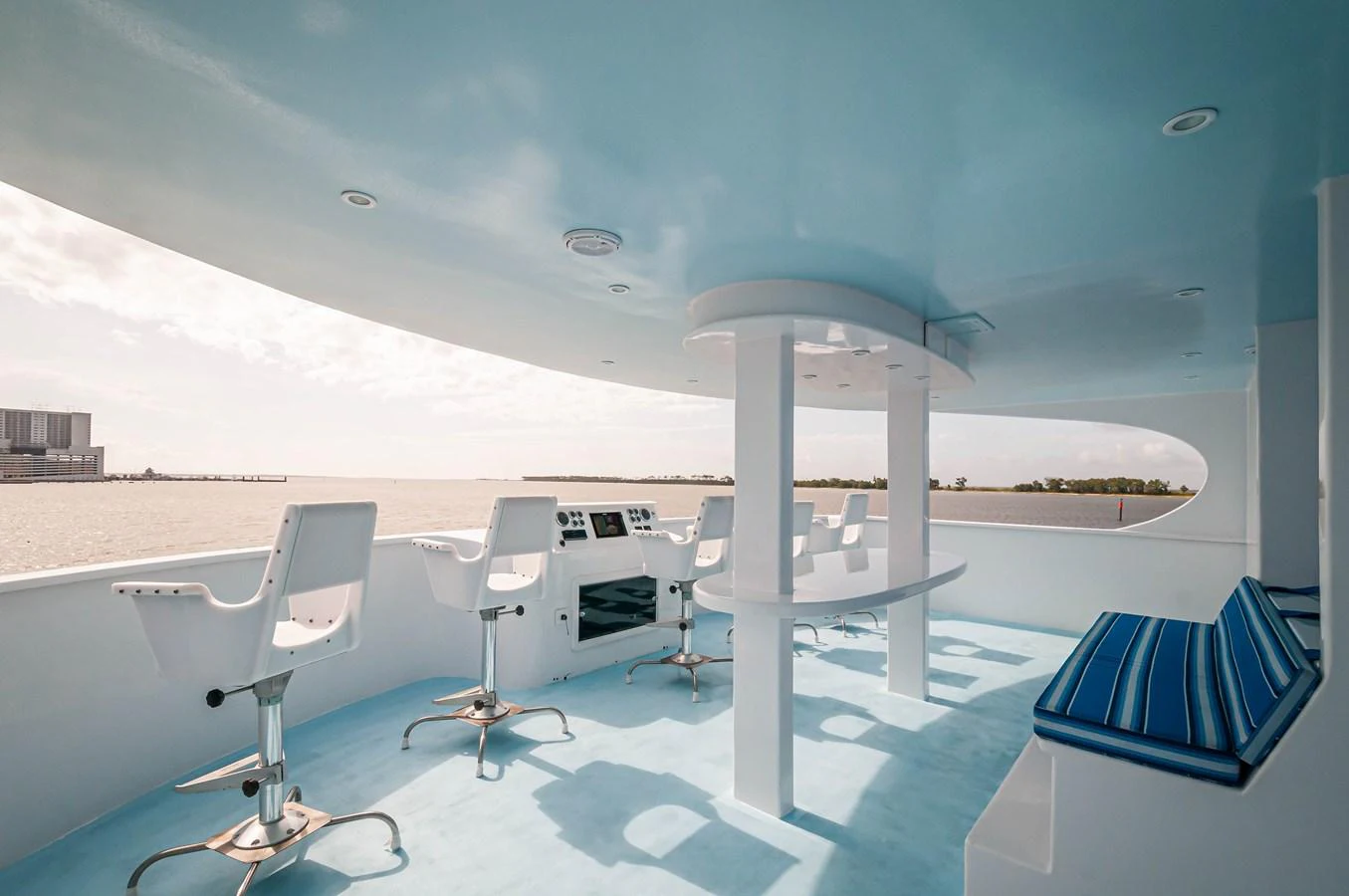 a room with a table chairs and a large white table aboard LE COLBY JEAN Yacht for Sale