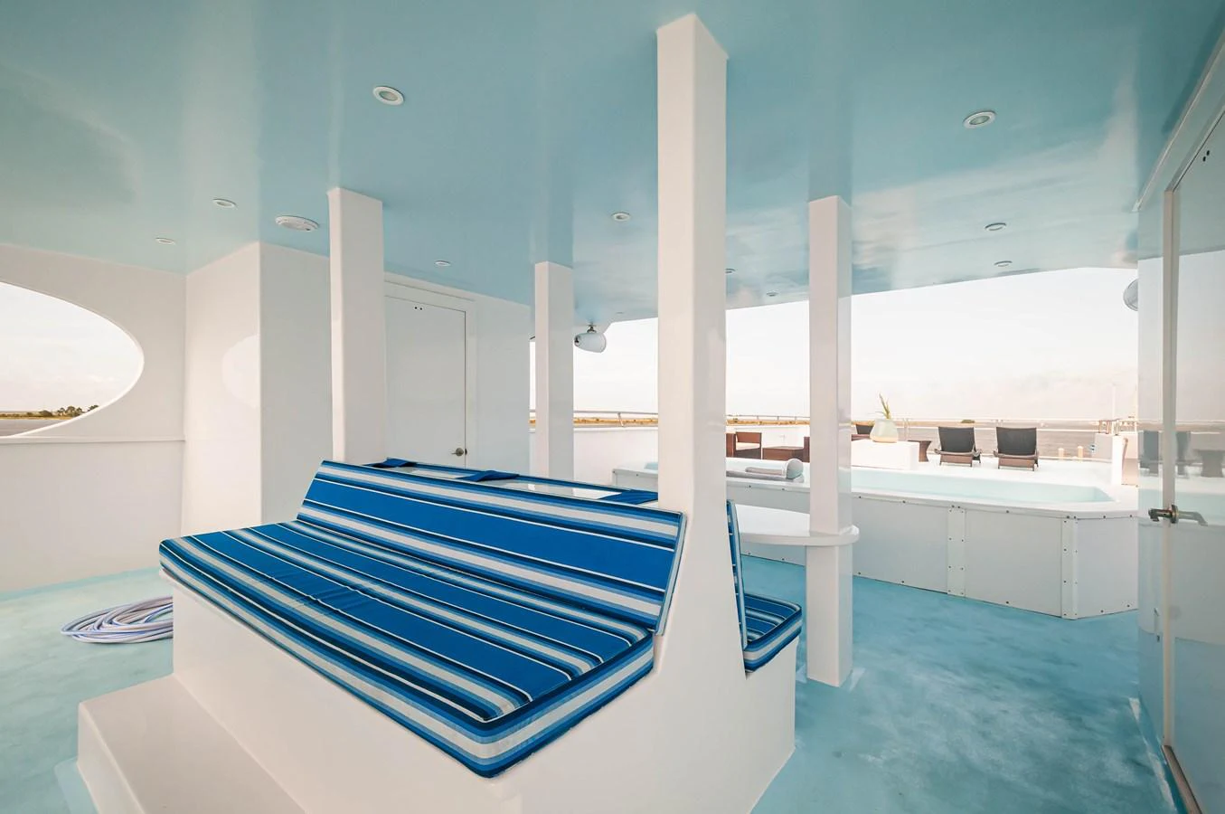 a large room with a pool table aboard LE COLBY JEAN Yacht for Sale