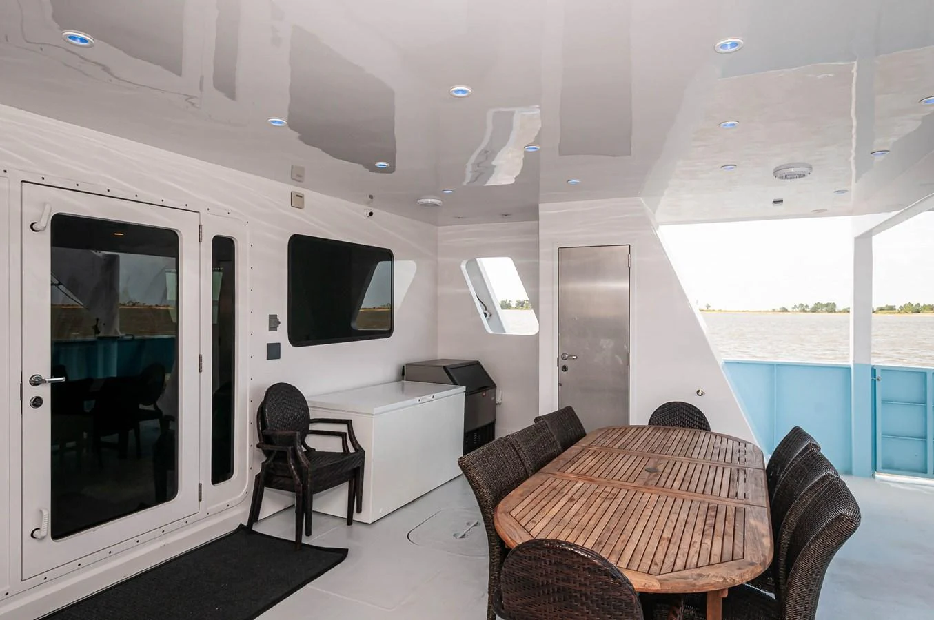 a living room with a couch and a tv aboard LE COLBY JEAN Yacht for Sale