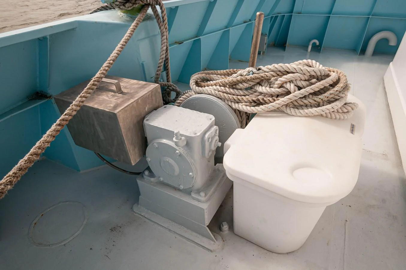 a toilet with a basket on the seat aboard LE COLBY JEAN Yacht for Sale