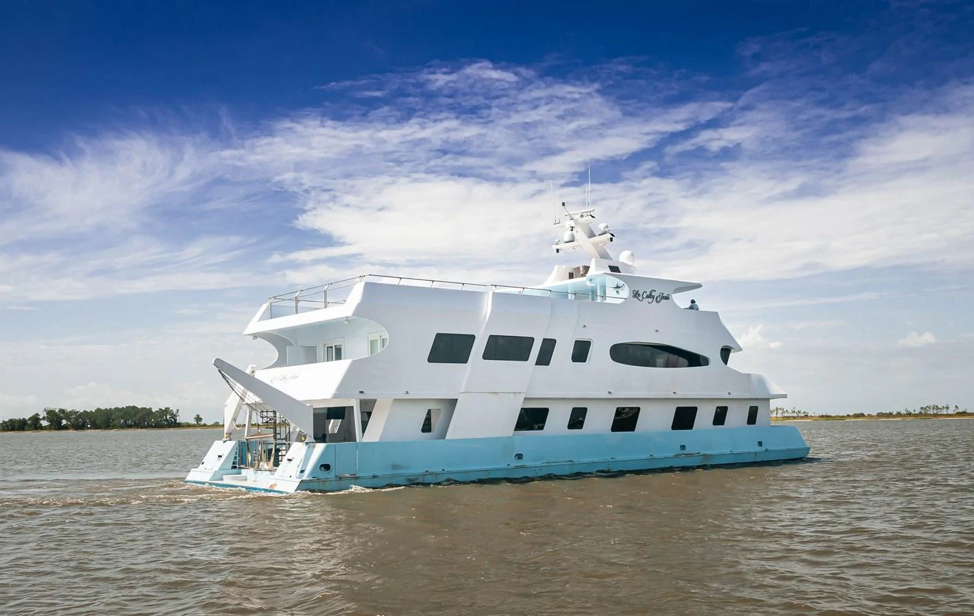 a boat on the water aboard LE COLBY JEAN Yacht for Sale