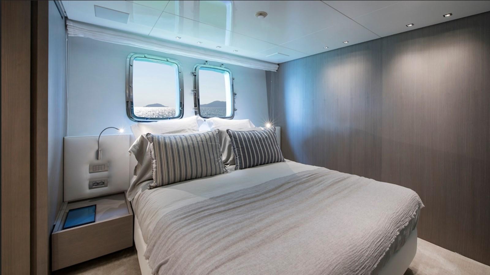 a bed in a room aboard DINAIA Yacht for Sale