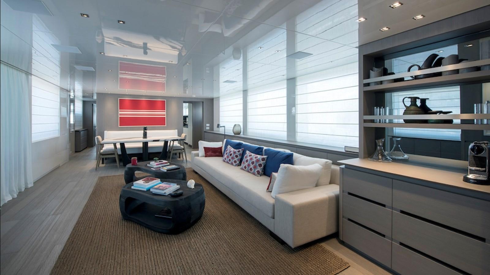 a living room with a couch and a tv aboard DINAIA Yacht for Sale