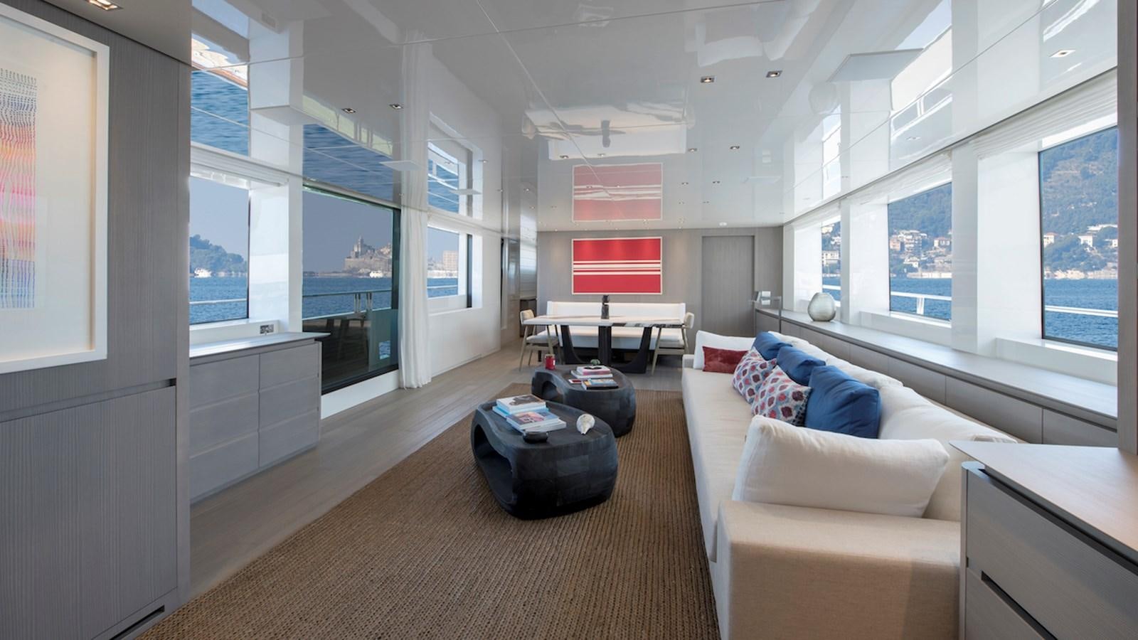 a living room with a large window aboard SANLORENZO SL106 Yacht for Sale
