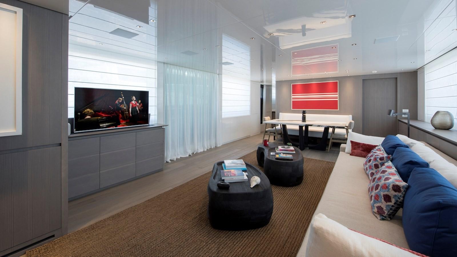 a living room with a tv and a couch aboard SANLORENZO SL106 Yacht for Sale