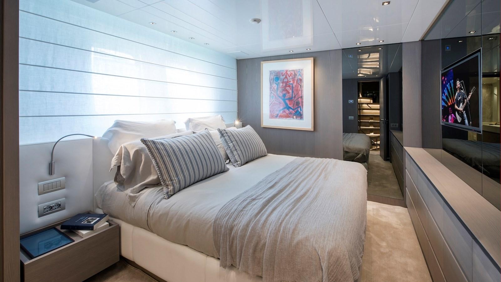 a bed in a room aboard SANLORENZO SL106 Yacht for Sale