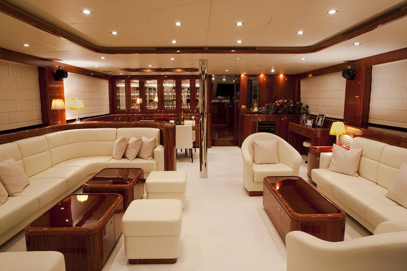 a large living room with a large window aboard QUEEN GRACE Yacht for Sale