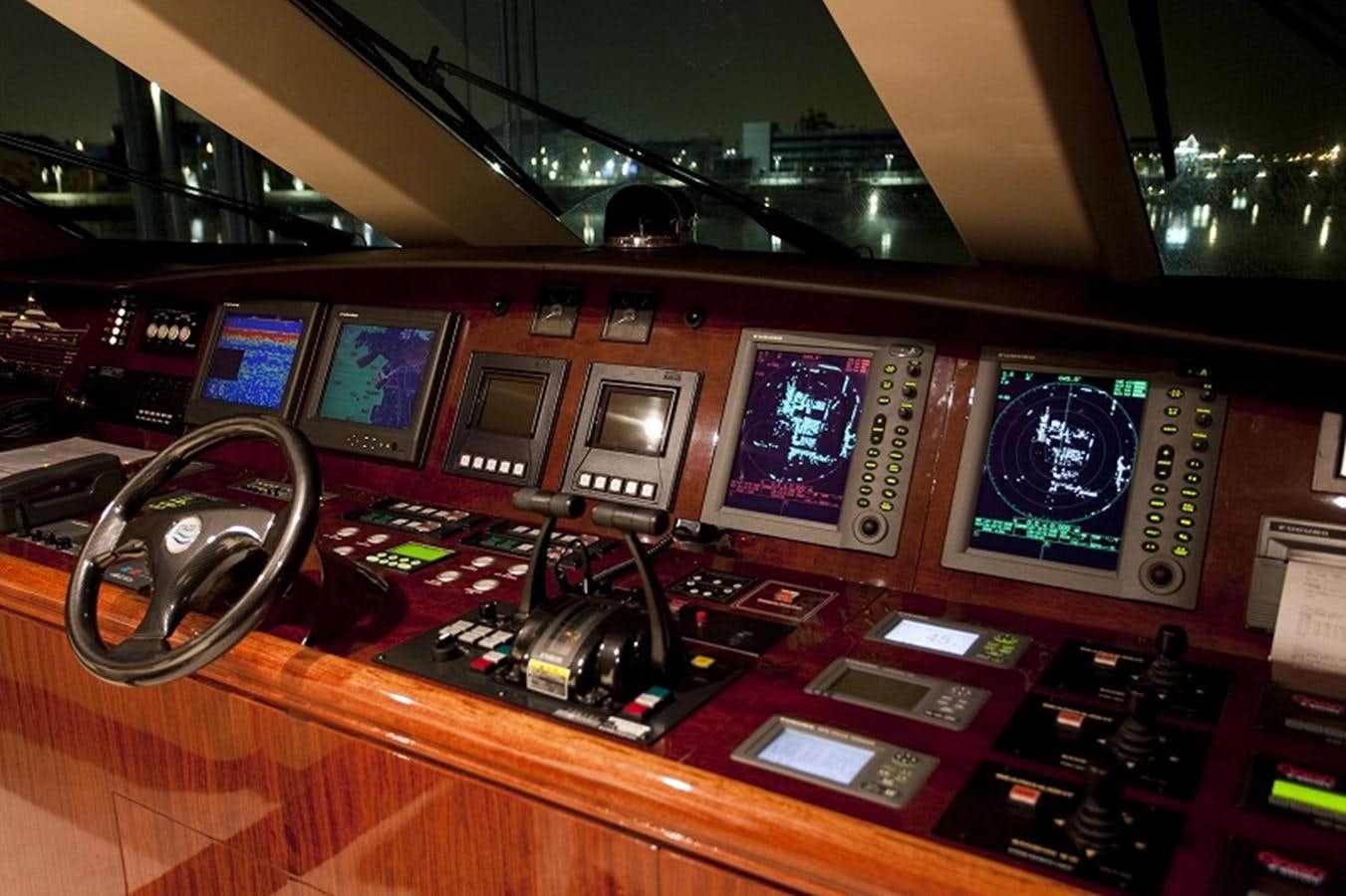 a control panel with many screens aboard QUEEN GRACE Yacht for Sale