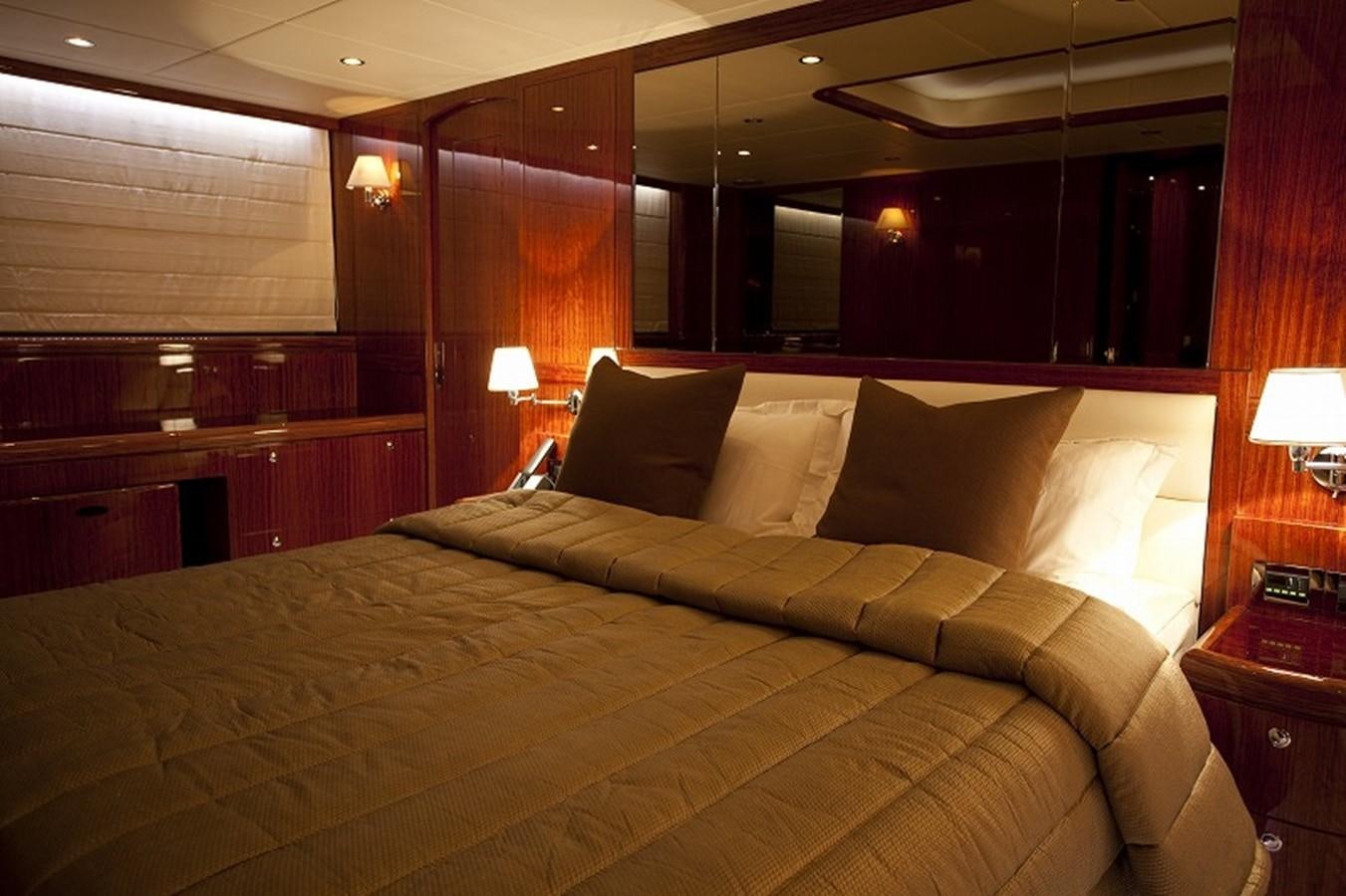 a bed with a large bed aboard QUEEN GRACE Yacht for Sale