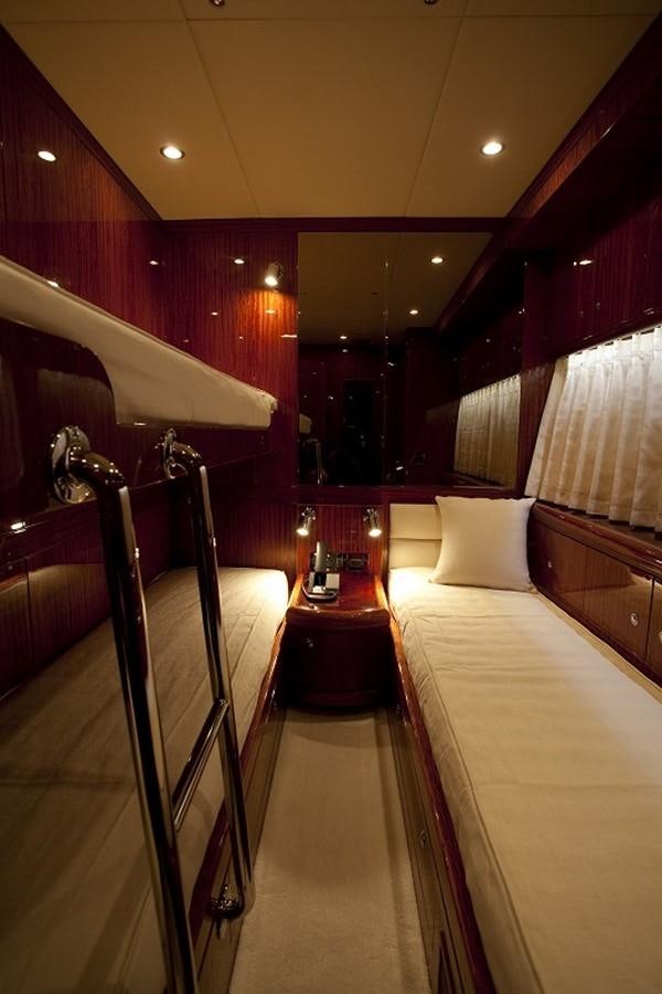 a room with bunk beds aboard QUEEN GRACE Yacht for Sale