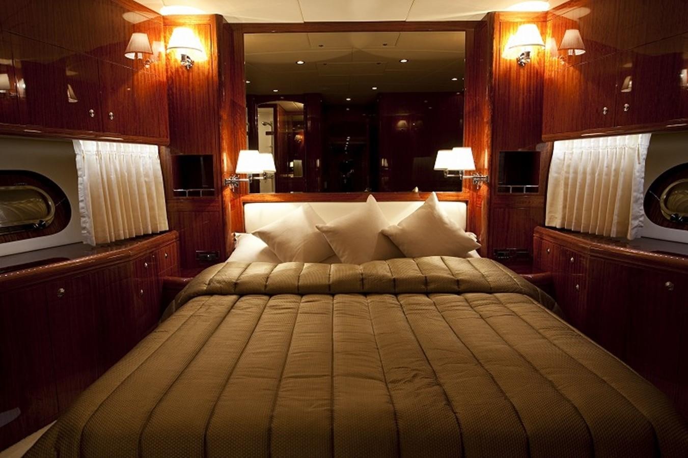 a bed with a large bed aboard QUEEN GRACE Yacht for Sale