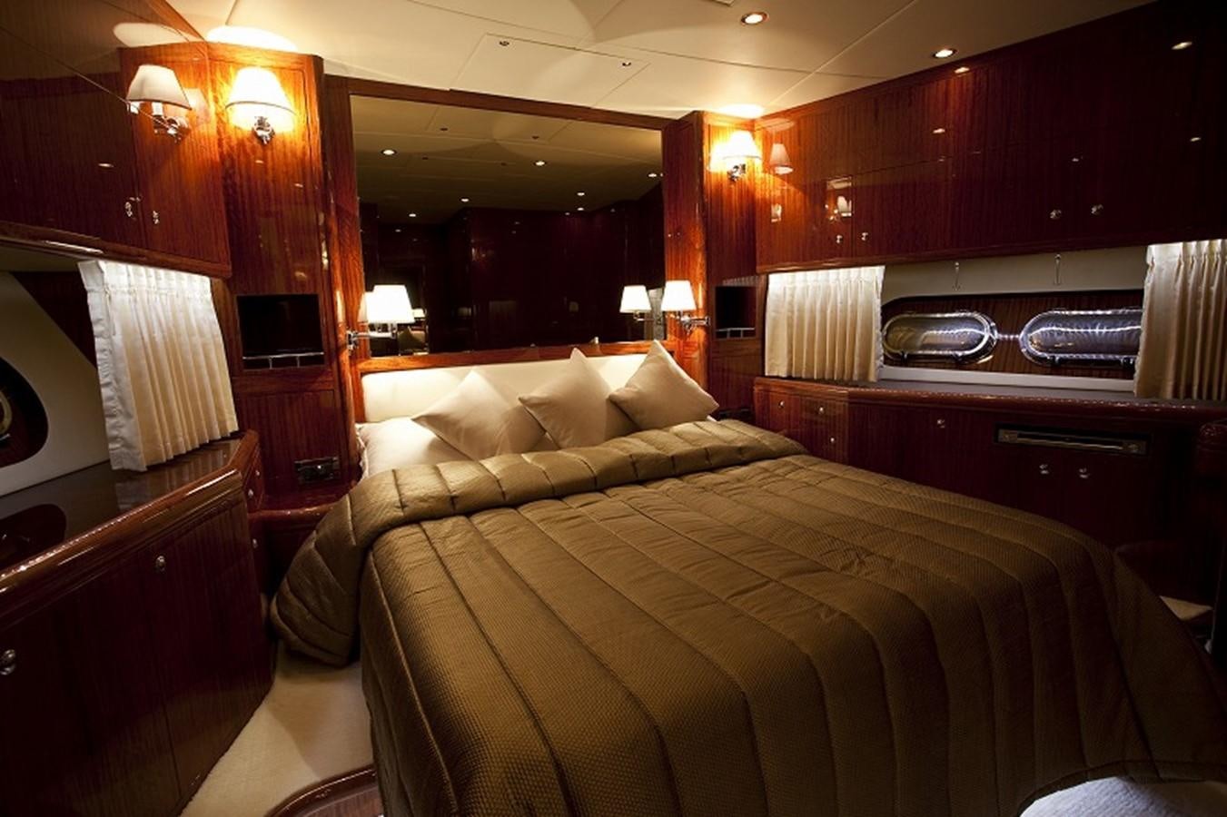 a hotel room with a bed aboard QUEEN GRACE Yacht for Sale