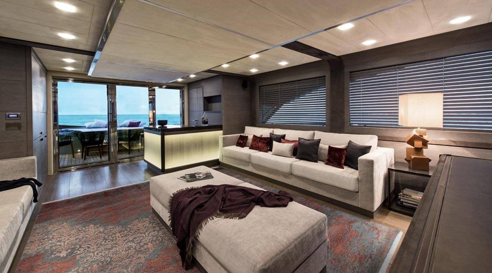 a large hotel room with a large bed and a large window aboard MONTE CARLO YACHTS MCY 105 Yacht for Sale