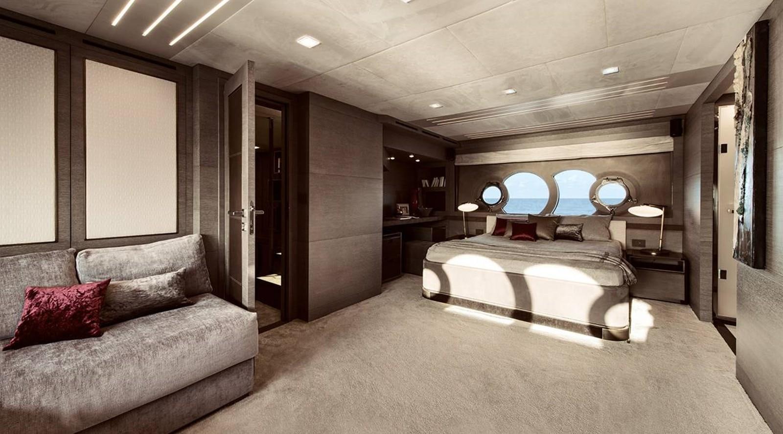 a large bedroom with a bed aboard MONTE CARLO YACHTS MCY 105 Yacht for Sale
