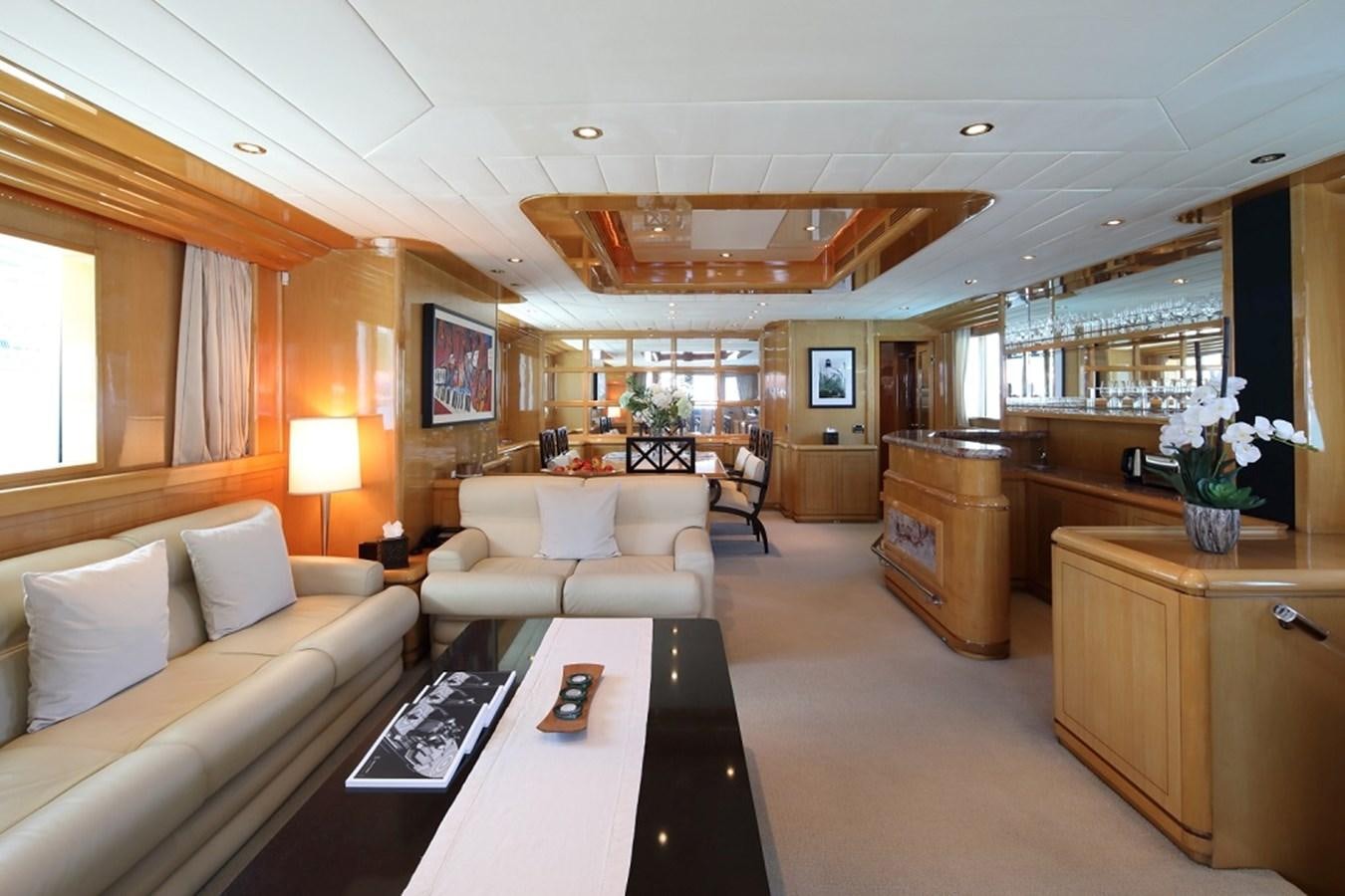 a living room with a large window aboard INDIGO Yacht for Sale
