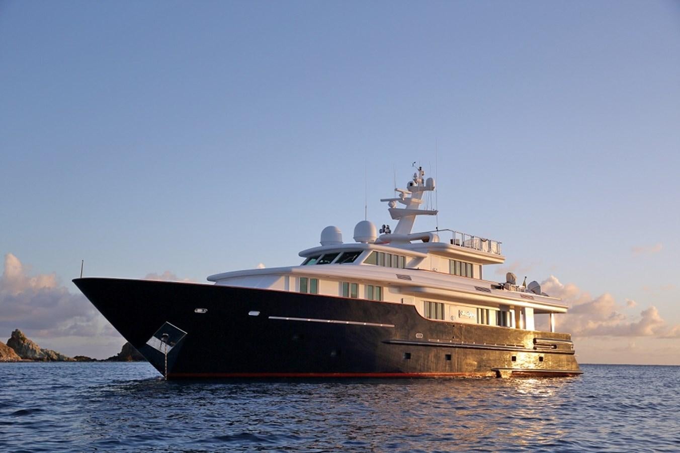 a large boat in the water aboard INDIGO Yacht for Sale