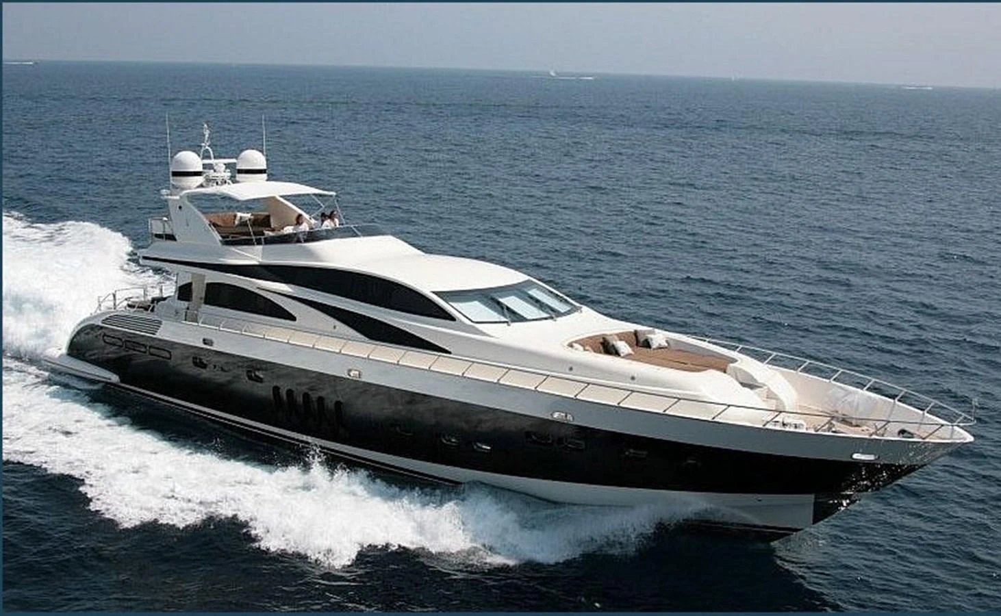 a white yacht on the water aboard WHITE PEARL Yacht for Sale