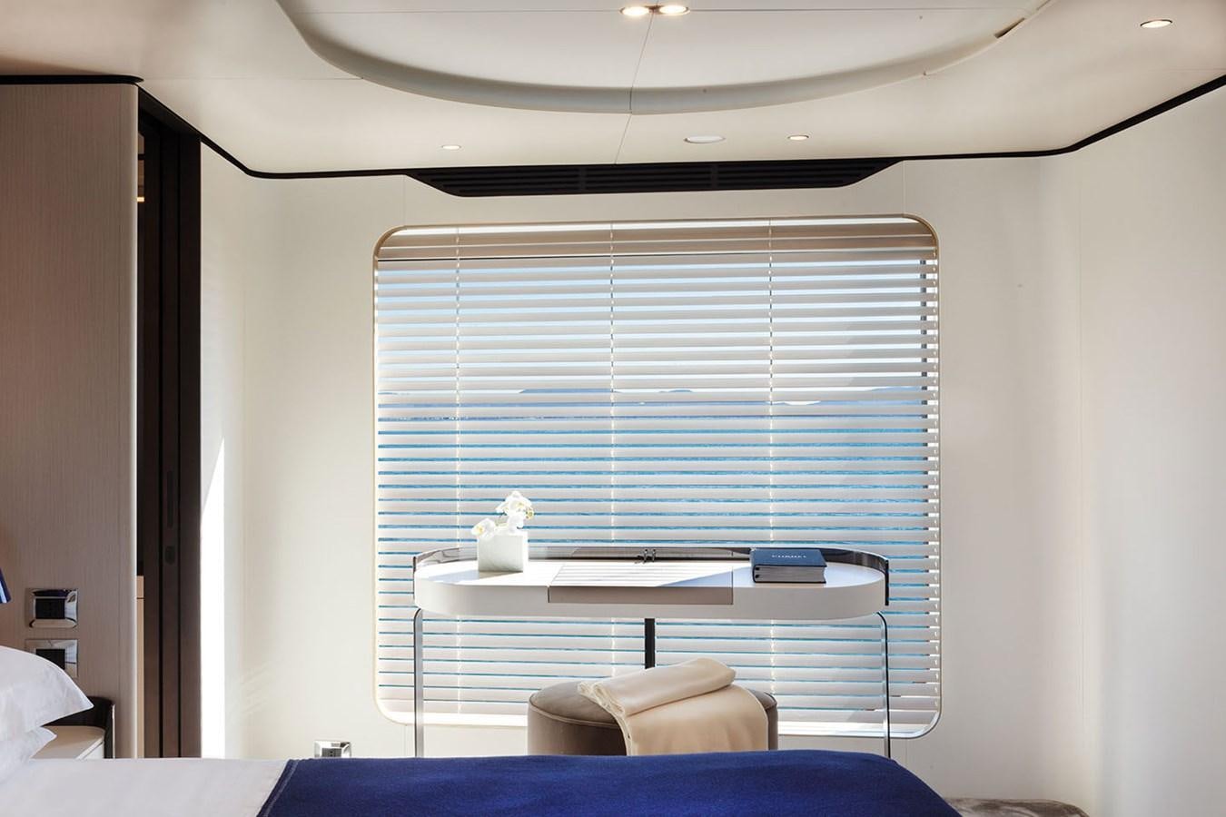 a room with a table and a window aboard ALBA Yacht for Sale