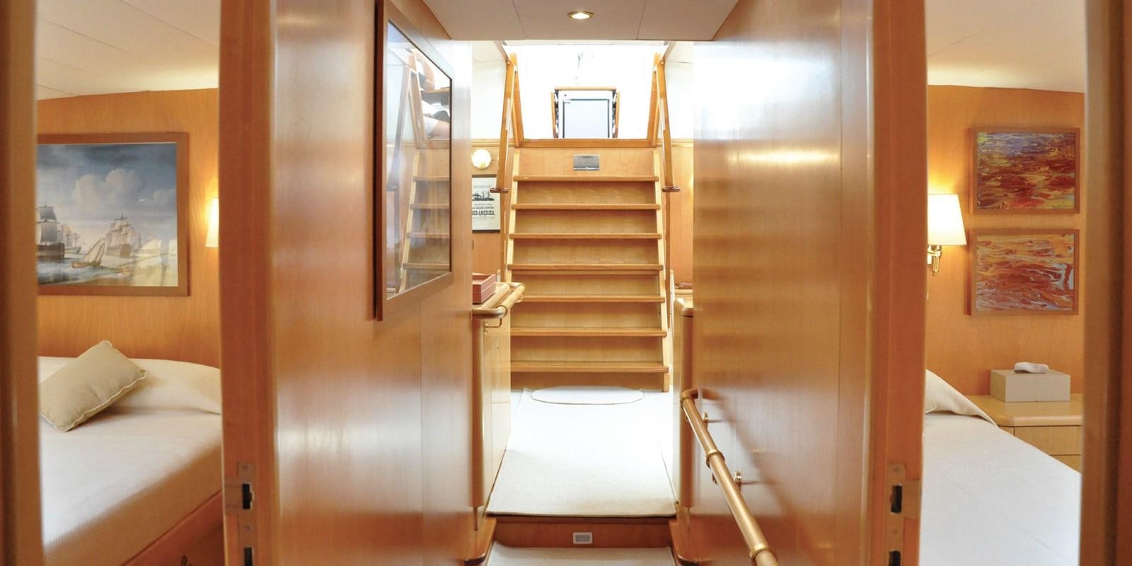 a bunk bed with a ladder aboard ASAHI Yacht for Sale