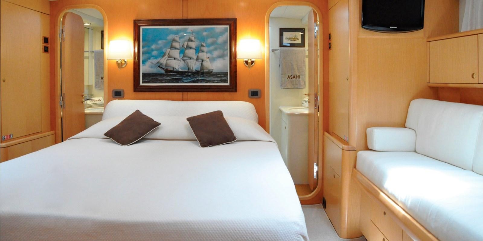 a bed in a room aboard ASAHI Yacht for Sale