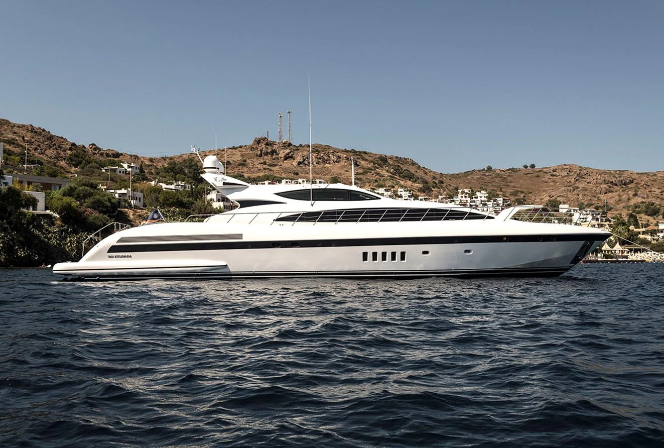 a white yacht in the water aboard DANUSH Yacht for Sale