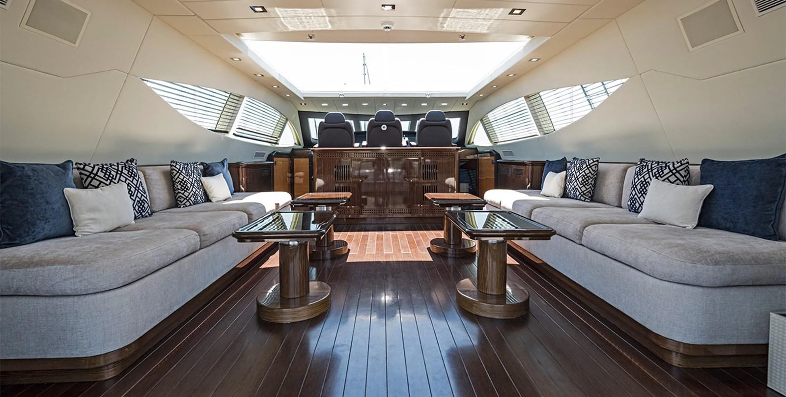 a living room with a couch and a coffee table aboard DANUSH Yacht for Sale