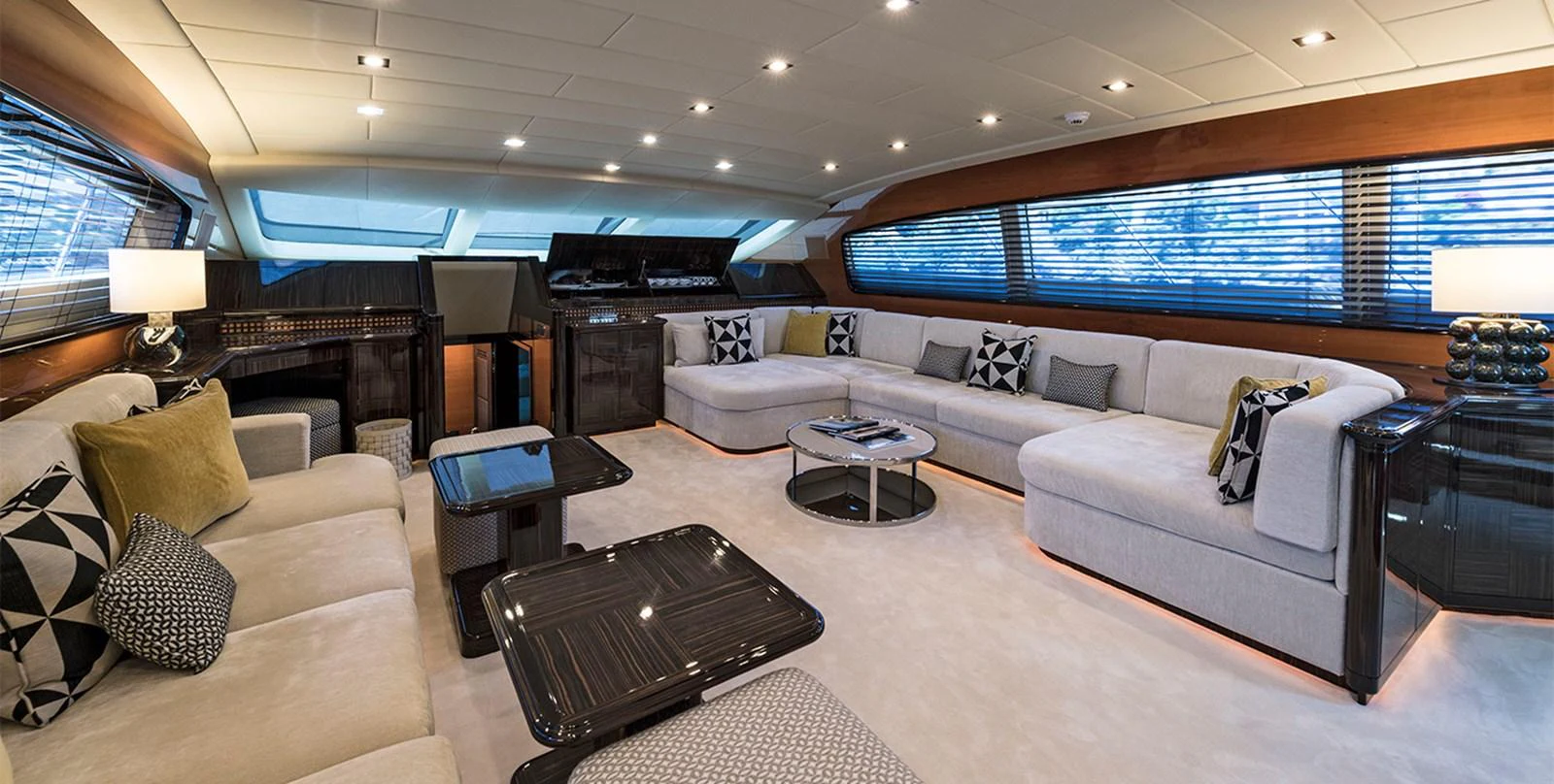 a living room with a large window aboard DANUSH Yacht for Sale